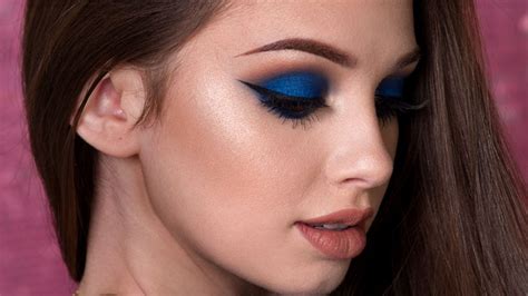 makeup with dark blue dress